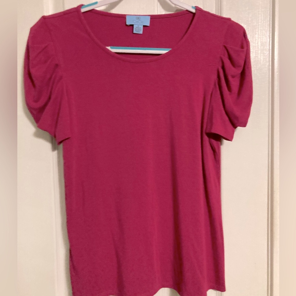 CeCe sz M top in a pink fuchsia color with a puff sleeve worn once